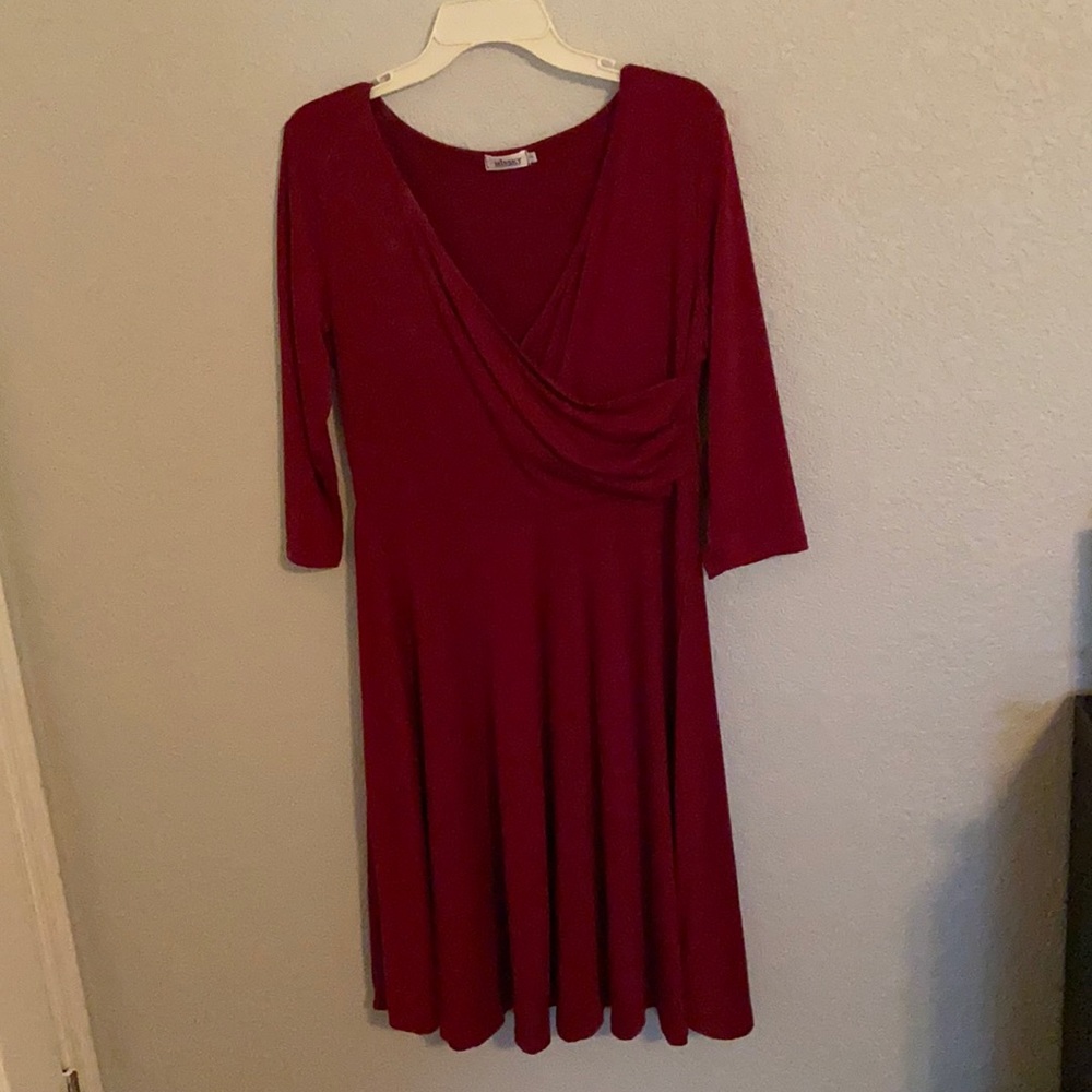 3/4 sleeve dress. Hits below the knees
